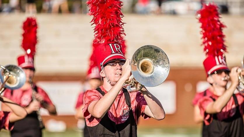 An LR student playing the trumpet
