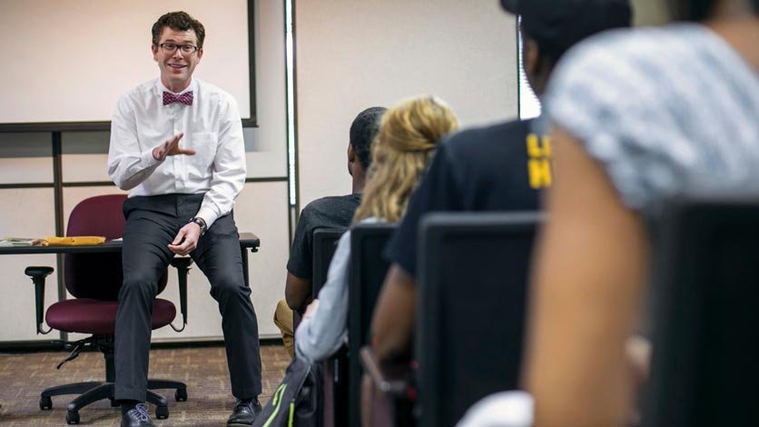 Professor talks to class during lecture