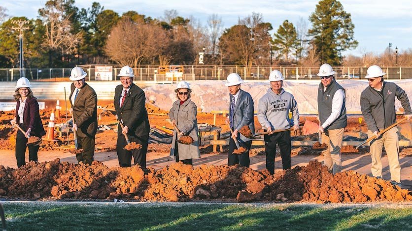 LR alumni and friends break ground with shovels during Moretz Stadium groundbreaking event