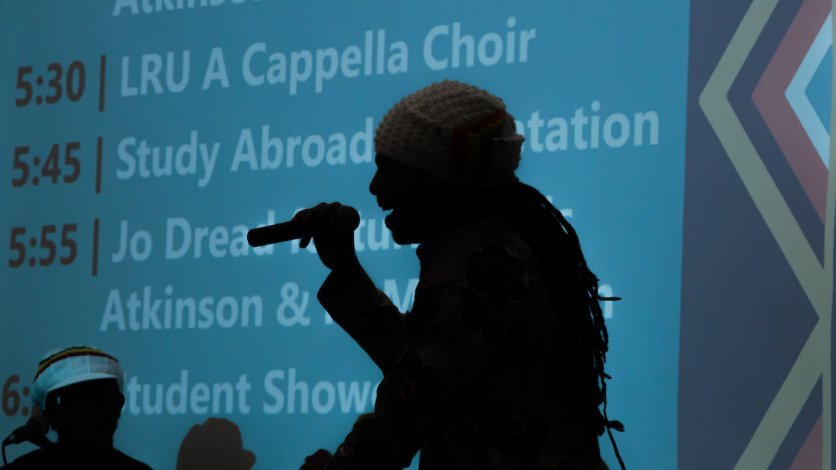 A singer performs on stage