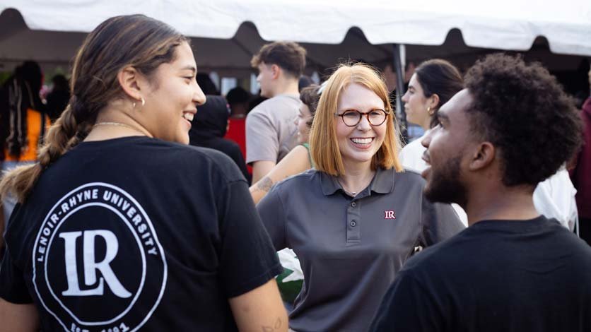 President McGee talks with LR students during Welcome Weekend cookout on campus